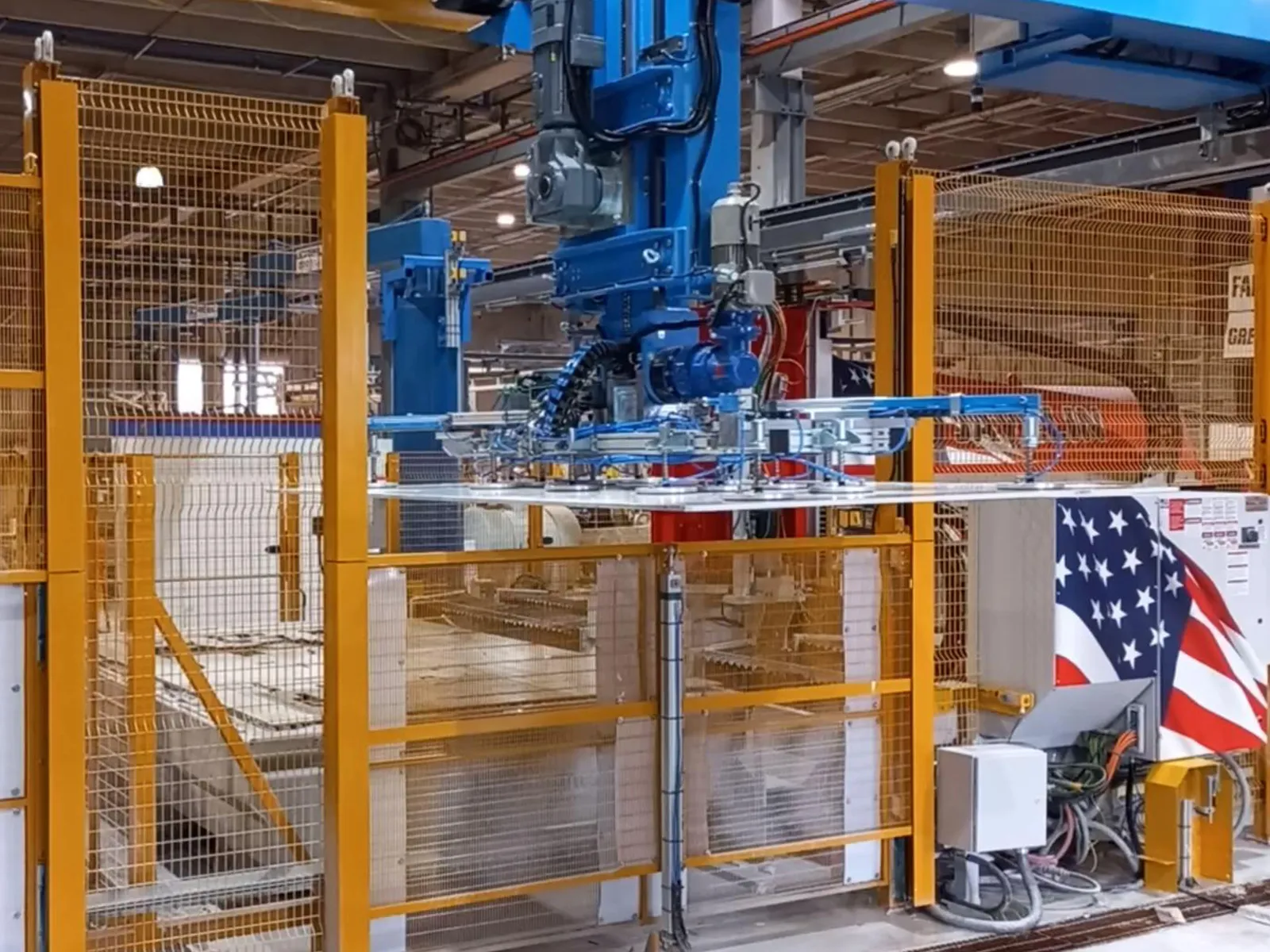 USA, 2025 — Handling system feeding four robotic saws