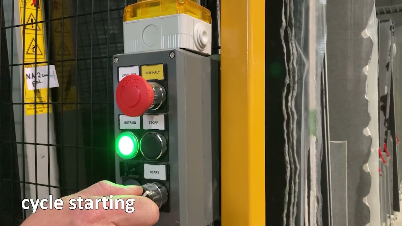 Standalone semi-automatic storage system with Omega Flip, for retrieval of the slabs that are further back.